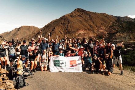 Lloyds Banking Group Team hiking Mount Toubkal together with flag