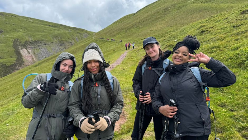 smiling charity challenge participants on uk hike