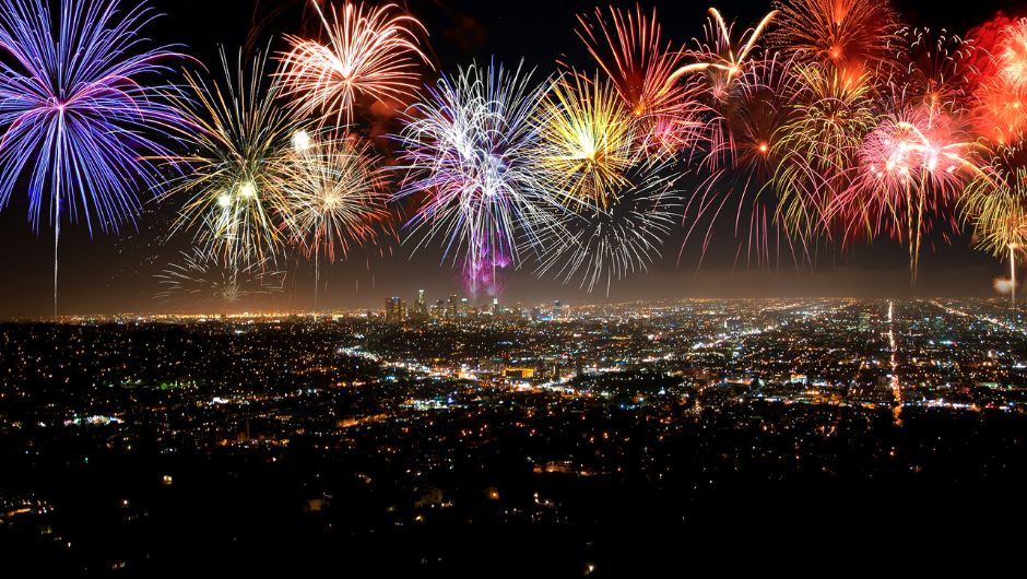 New Years Eve fireworks over a city skyline