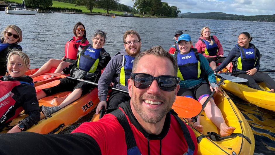 A group of kayakers out on a lake