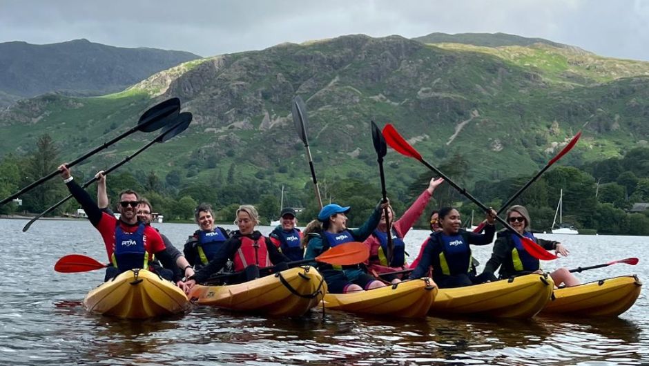 capital one employees enjoying kayaking during the lake district triple challenge