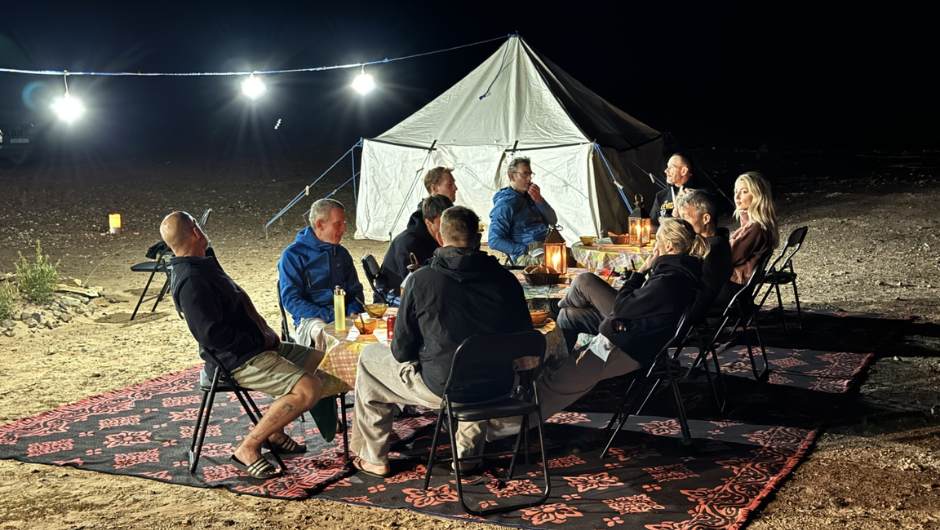 Camping under the starry desert sky