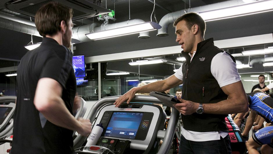 A specialist from the altitude centre running through a training session in the gym, on a treadmill