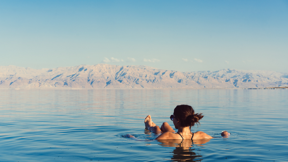 A person floating in Jordan's famous Dead Sea, the lowest point on earth.