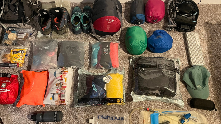 multi-day trekking kit organised and laid out ahead of being packed