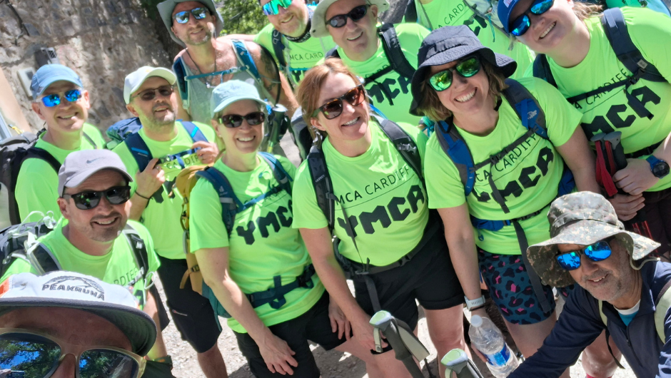 a group of trekkers smiling together on the ymca cardiff mount toubkal trek
