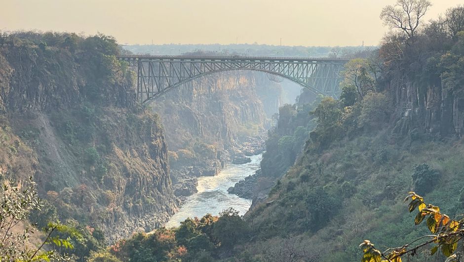 A landscape shot of the Victoria Falls Bridge in Zambia.